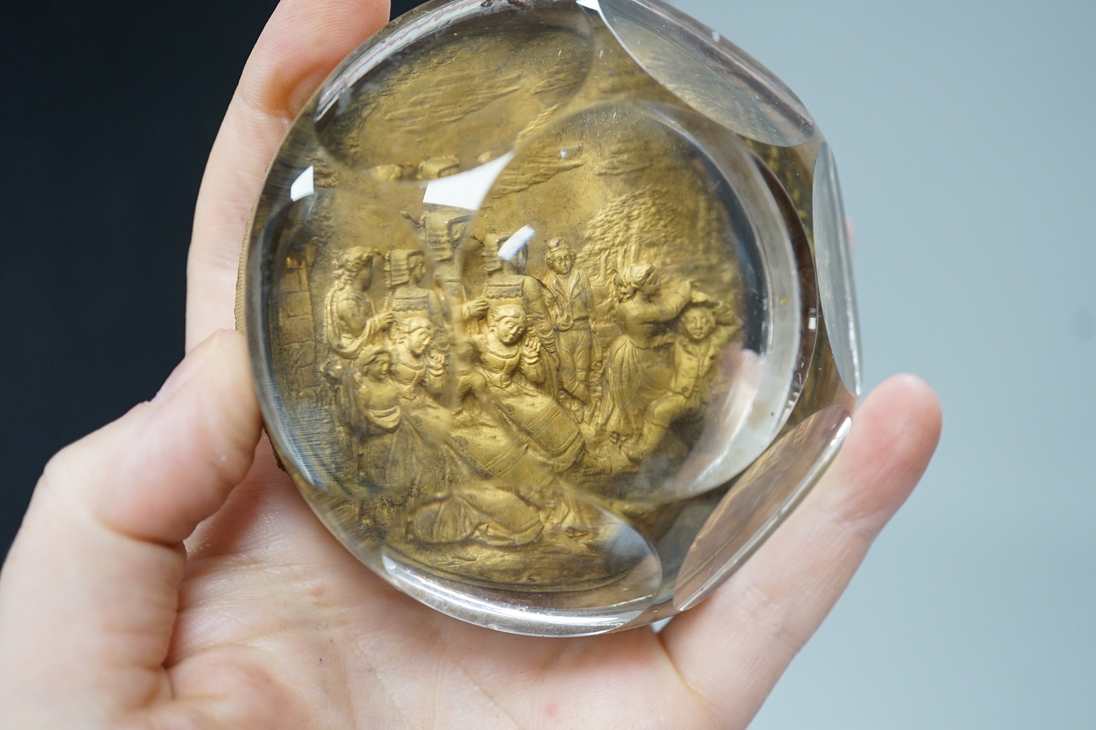 Temple Bar commemorative cast lead and brass paperweight, ‘Temple Bar: erected 1672, demolished 1878; this effigy of it was struck from the lead formally on the roof’ and a 19th century gilt metal relief glass cased pape